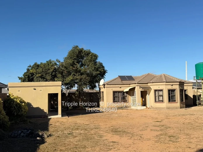 Walled Ruwa 2BR Home with Solar, Flatlet & Tank