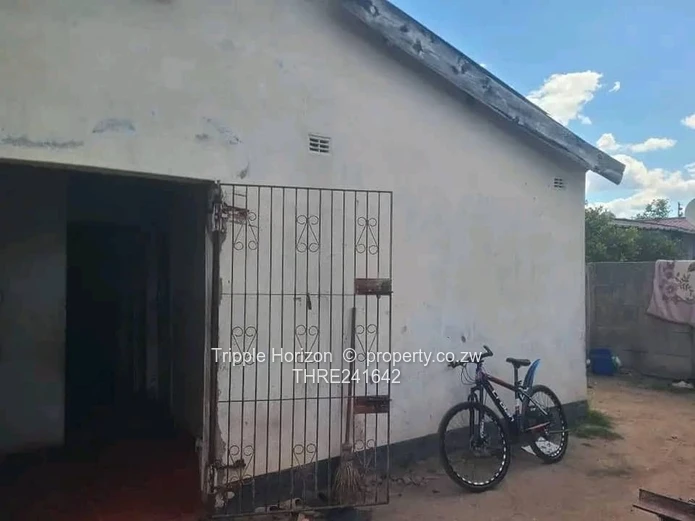 Chitungwiza 4-Bed Brick Home with Secure Paved Yard