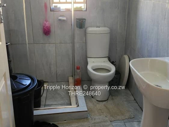 Walled Ruwa 2BR Home with Solar, Flatlet & Tank
