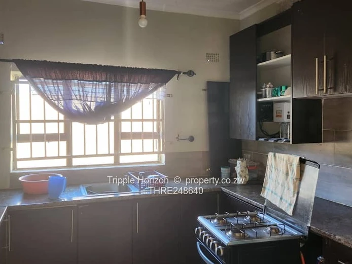 Walled Ruwa 2BR Home with Solar, Flatlet & Tank