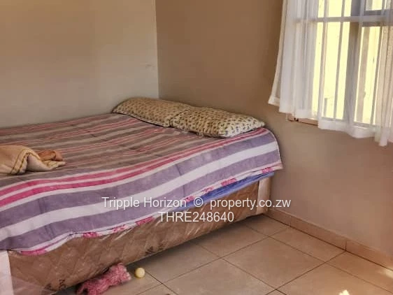Walled Ruwa 2BR Home with Solar, Flatlet & Tank